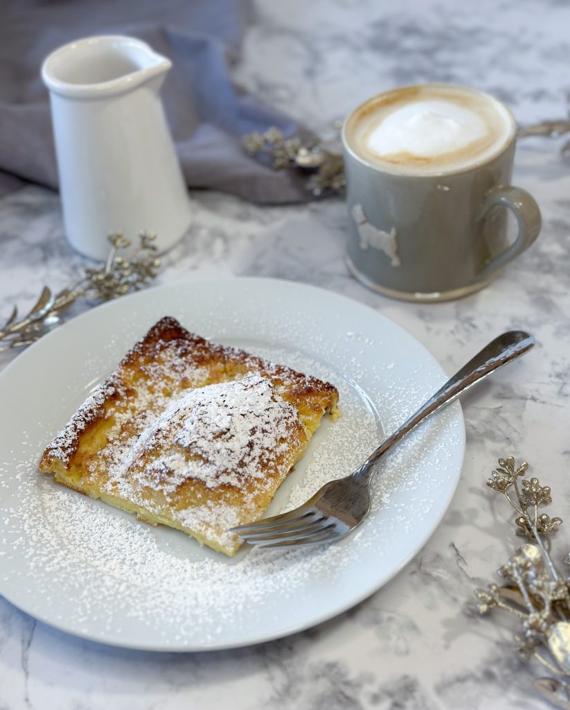 Image of a slice of sourdough german pancake served on a plate
